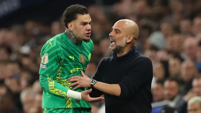 Pep Guardiola speaks to Ederson