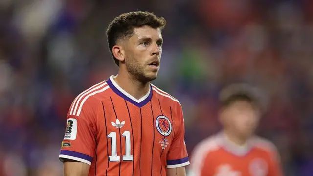 Ryan Christie looks on for Scotland