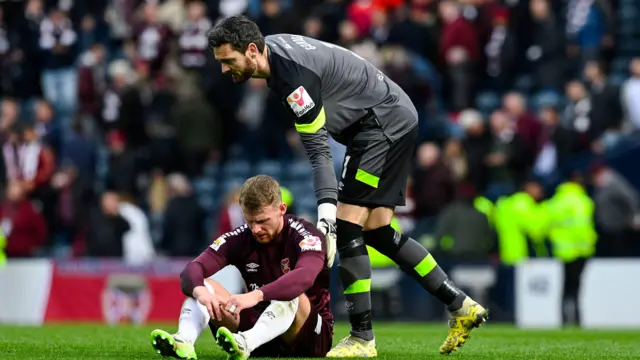 Craig Gordon consoles Stephen Kingsley