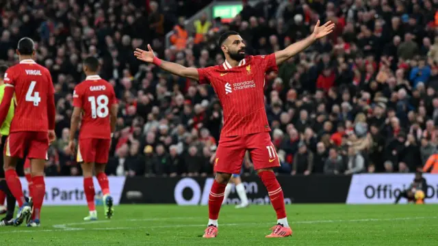 Mohamed Salah of Liverpool celebrating after scoring the second Liverpoolgoal during the Premier League match between Liverpool FC and Brighton & Hove Albion FC at Anfield