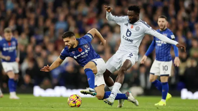 Ipswich Town's Sam Morsy is brought down by Wilfred Ndidi of Leicester City