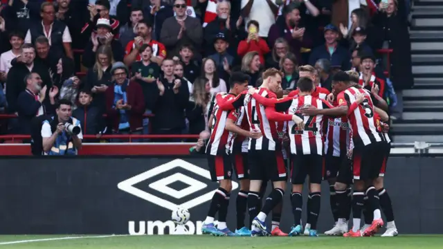 Nathan Collins of Brentford celebrates scoring his team's first goal