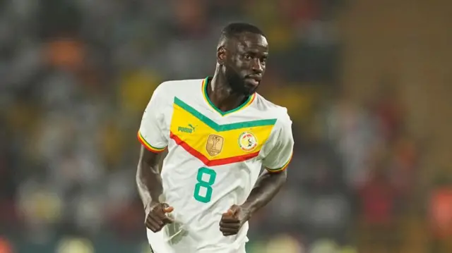 Cheikhou Kouyate of Senegal looks on during the TotalEnergies CAF Africa Cup of Nations group stage match between Guinea and Senegal at Stade Charles Konan Banny de Yamoussoukro