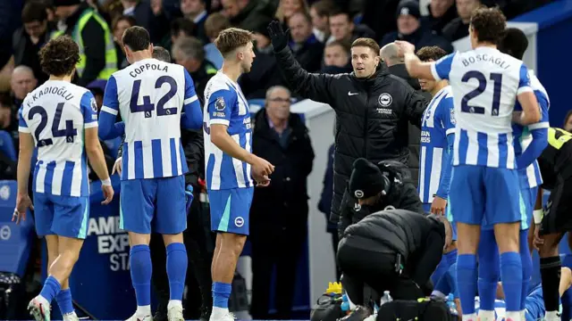 Fabian Hurzeler passing instructions to Brighton players