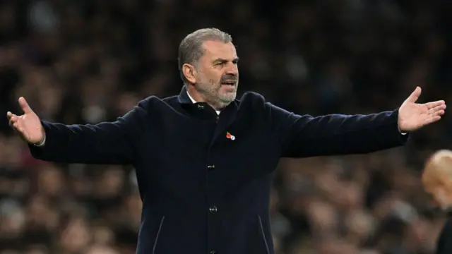 Ange Postecoglou gestures from the touchline