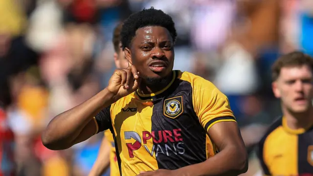 Newport County's Bobby Kamwa celebrates