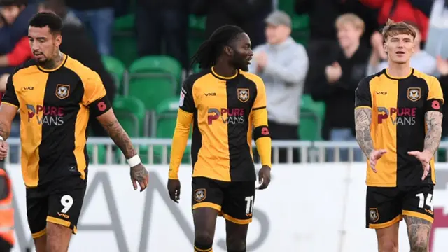 Newport County players look deflated