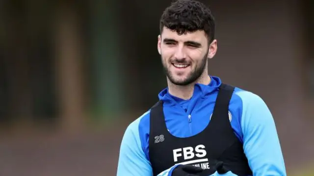 Tom Cannon smiles during a training session