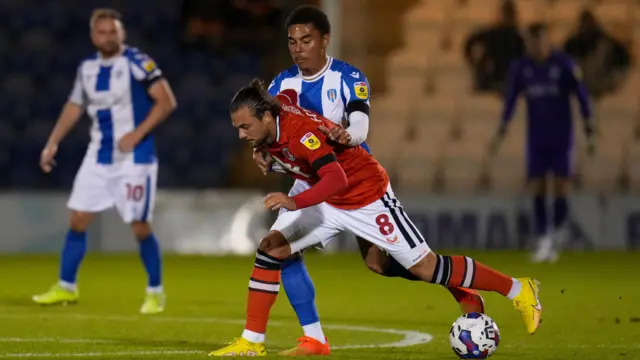 Marley Marshall-Miranda challenges for the ball during a match 