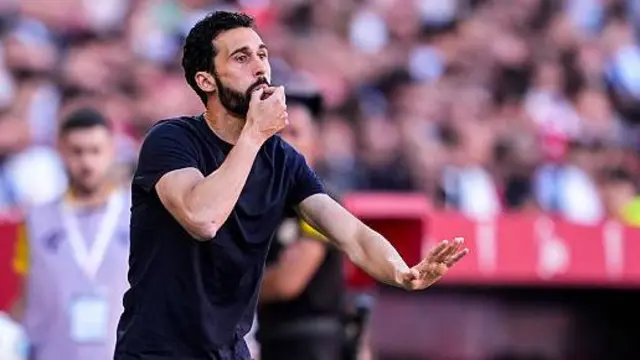 Alvaro Arbeloa on the touchline trying to get his players' attention during a Real Madrid game