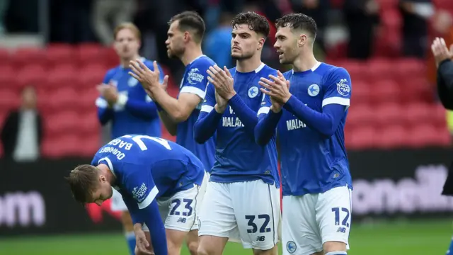 Cardiff players clap their fans after their draw at Bristol City