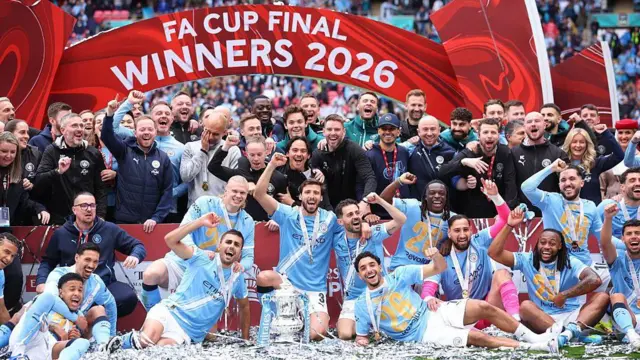 Manchester City players and staff