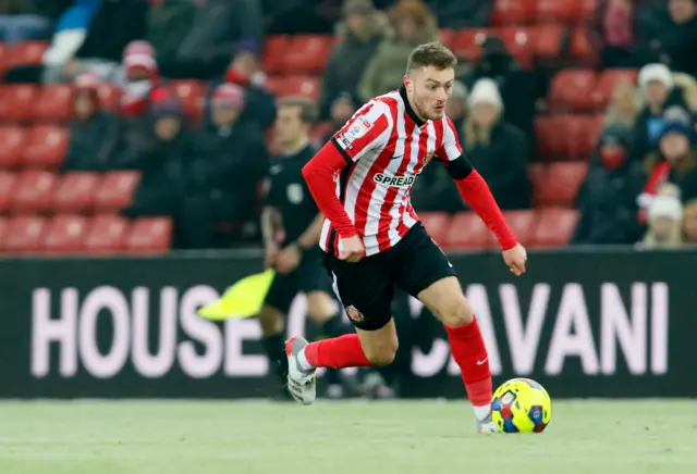 Elliot Embleton dribbles with a ball at the Stadium of Light