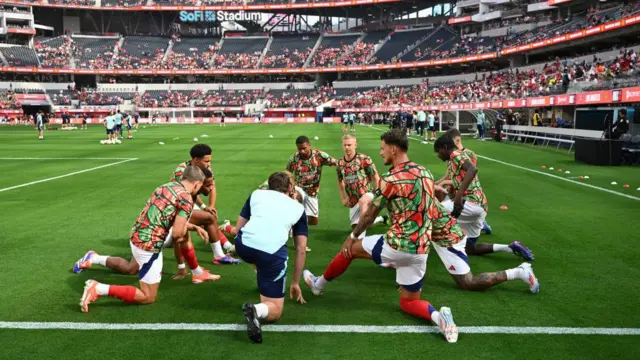 Arsenal FC players warm up prior to the Pre-Season Friendly match between Arsenal FC and Manchester United