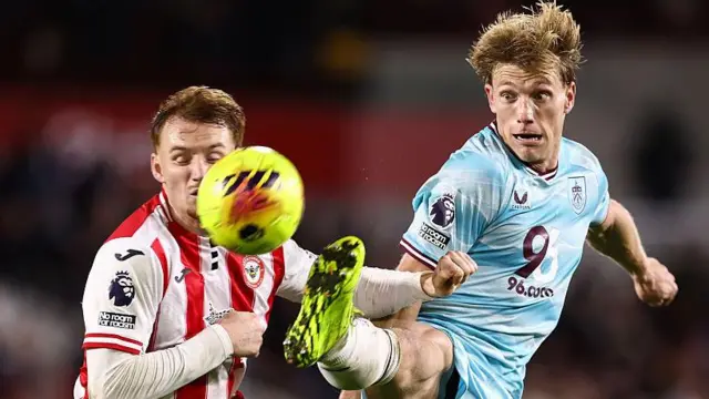  Zian Flemming of Burnley leaps to control the ball 
