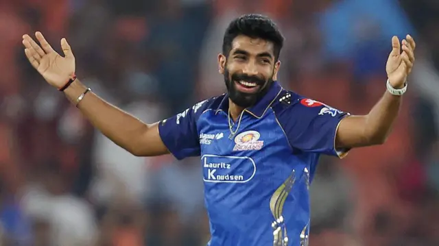 Mumbai Indians' Jasprit Bumrah celebrates after taking the wicket of Gujarat Titans' Sai Sudharsan