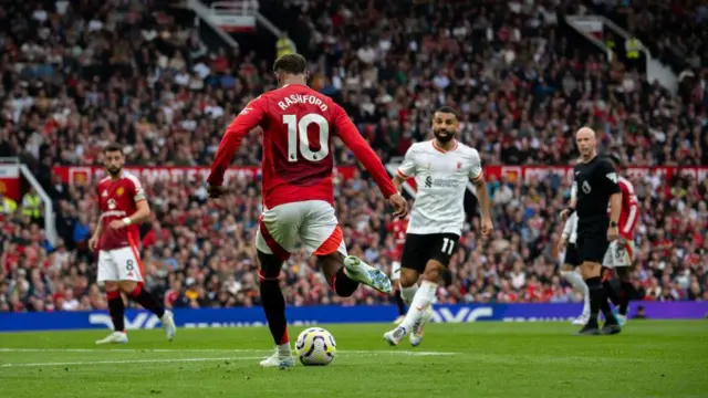 Marcus Rashford in action during the Premier League match between Manchester United and Liverpool