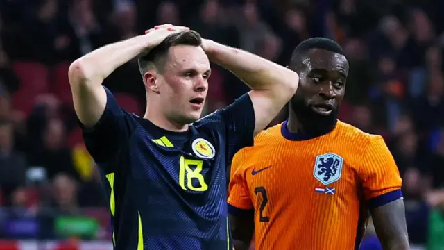 Lawrence Shankland looks dejected after his missed chance against the Netherlands