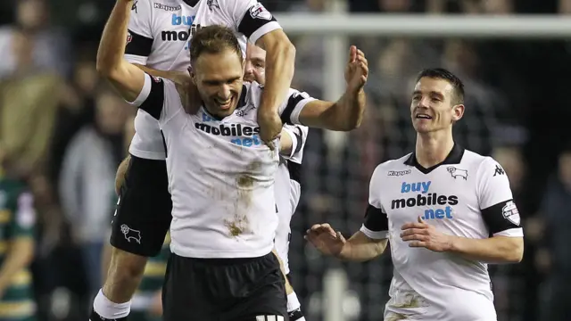 Craig Bryson joins the celebrations after John Eustace opened the scoring against QPR in February 2014.