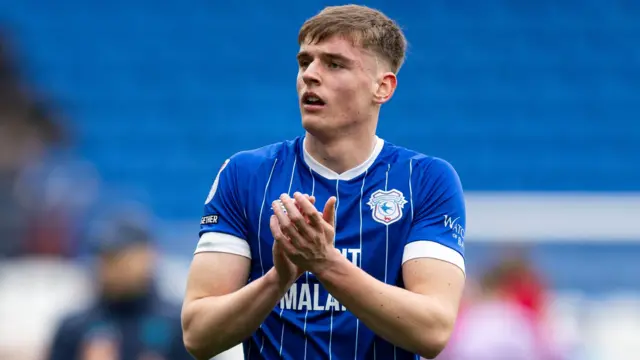 Cardiff City's Dylan Lawlor applauding the crowd at the Cardiff City Stadium
