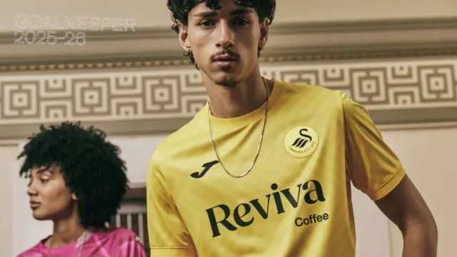 One of Swansea's new goalkeeper shirts worn by a model