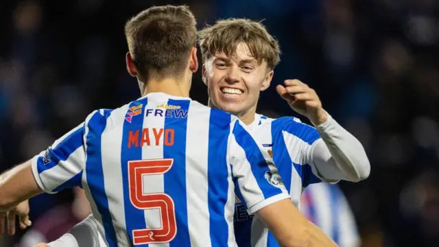 Kilmarnock's Fraser Murray (R) and Lewis Mayo (L) celebrate at full time during a William Hill Premiership match between Kilmanock and Heart of Midlothian at Rugby Park, 