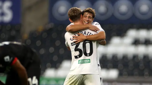 Ethan Galbraith and Goncalo Franco celebrate