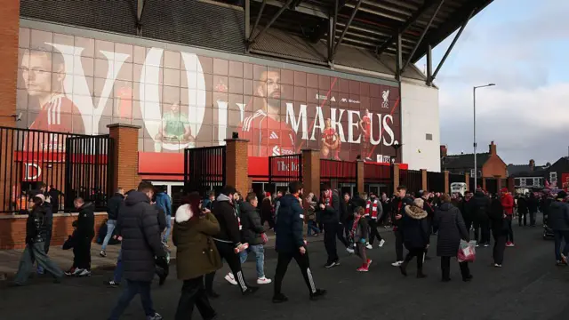 Liverpool fans arrive at the stadium 