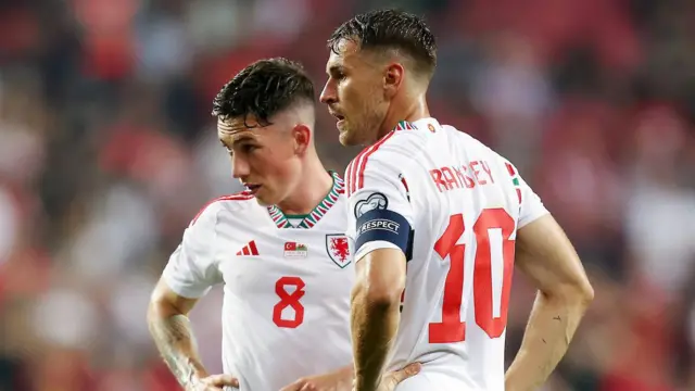 Harry Wilson and Aaron Ramsey in action for Wales in 2023