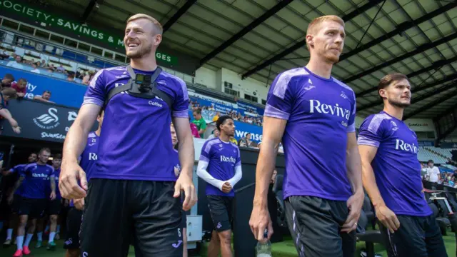 Harry Darling, Jay Fulton and Liam Cullen step out for Swansea training