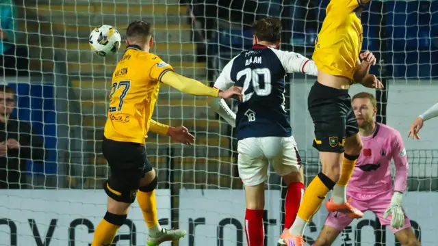 Livingston captain Danny Wilson (left) scores to earn his side a late point against Falkirk