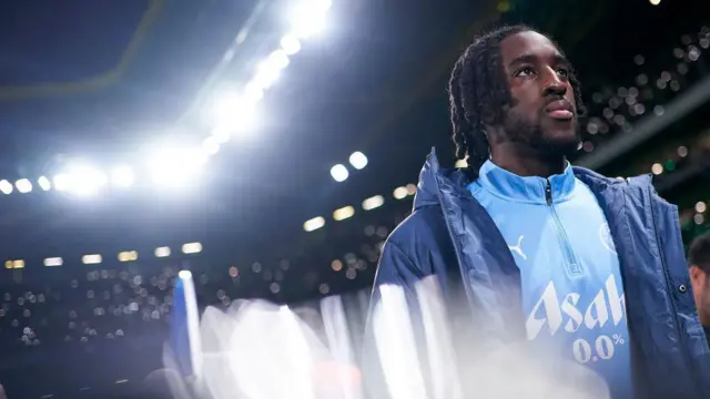 Josh Wilson-Esbrand of Manchester City looks on