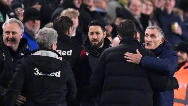 Boro boss Michael Carrick had a big hug for the returning Tony Mowbray