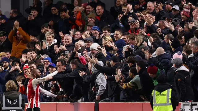  Igor Thiago of Brentford celebrates scoring with the fans