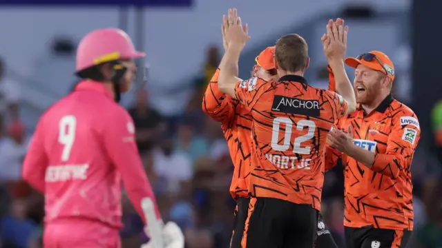 Anrich Nortje celebrates taking a wicket with his Sunrisers Eastern Cape team-mates