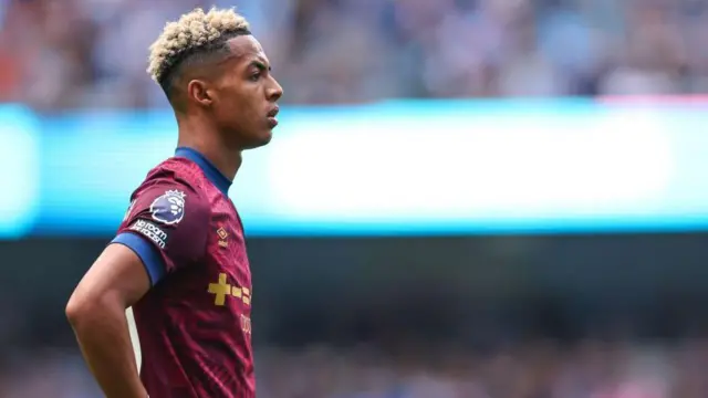 Omari Hutchinson looks on while in action for Ipswich