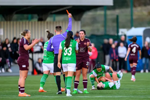 Hearts' Kathleen McGovern being shown a red card