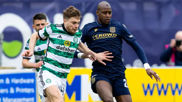 Celtic's James Forrest and Dundee's Mo Sylla