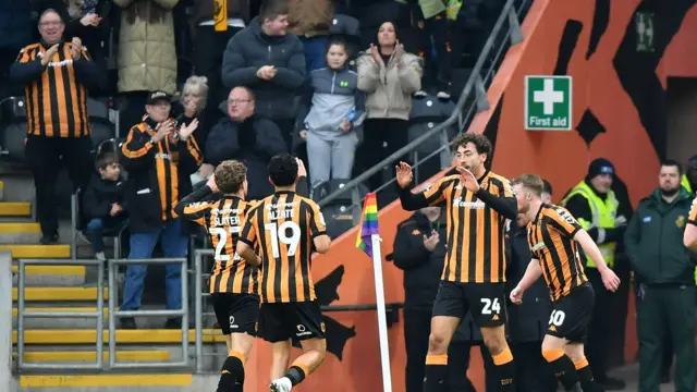 Hull City fans celebrate a goal