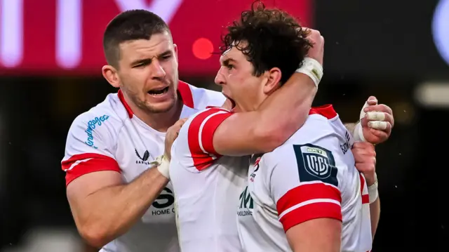 Tom Stewart celebrates scoring a try for Ulster with Nick Timoney