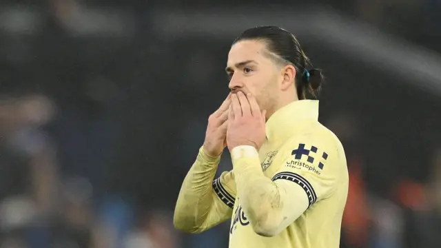 Jack Grealish puts fingers to lips as he acknowledges fans