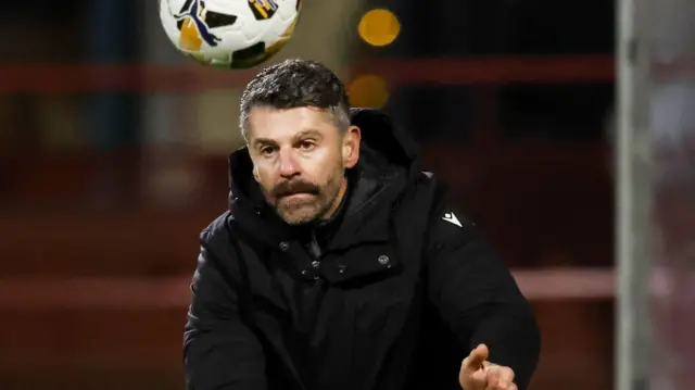 Stephen Robinson on the touchline