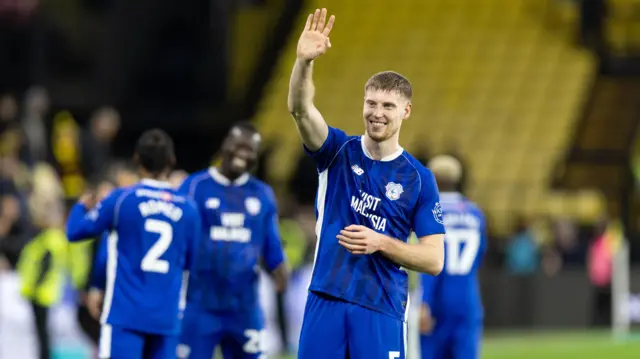 Mark McGuinness waves after a game for Cardiff City