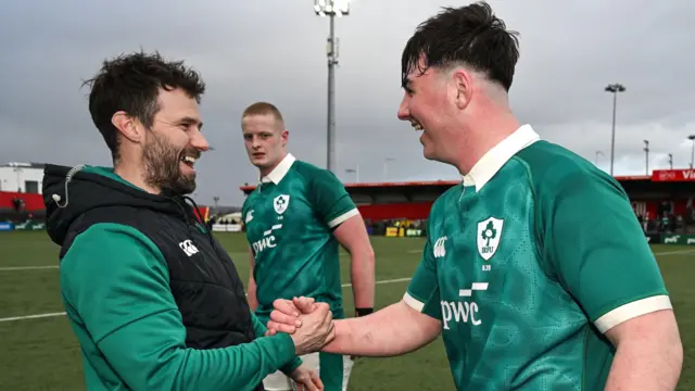 Ireland assistant coach Michael Hodge left, and Lee Fitzpatrick celebrate after the U20 Six Nations Rugby Championship match between Ireland and Scotland at Virgin Media Park in Cork.