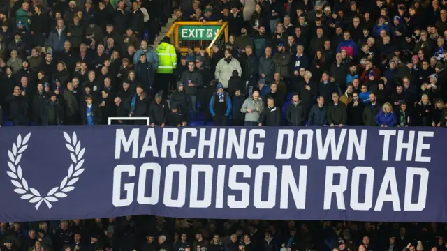 Everton fans hang a large banner in the stand reading "Marching down the Goodison road" prior to the Premier League match between Everton FC and Crystal Palace 