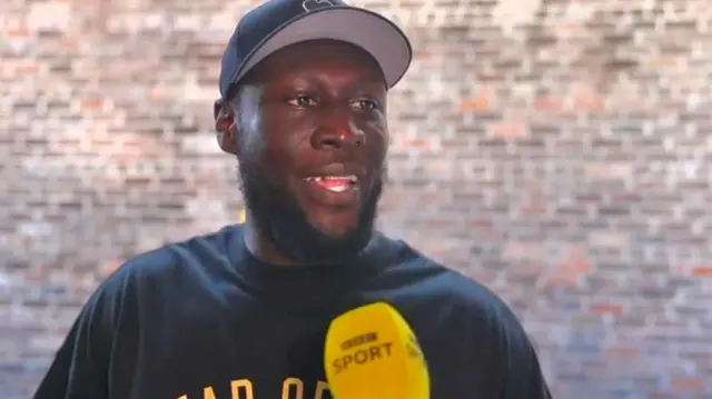 Stormzy speaking to BBC Sport's Nesta McGregor