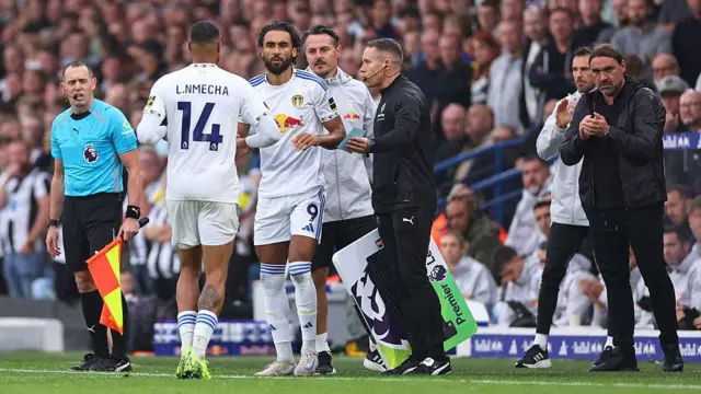Dominic Calvert-Lewin comes on for Lukas Nmecha during the Premier League match between Leeds United and Newcastle United at Elland Road, with Daniel Farke looking on