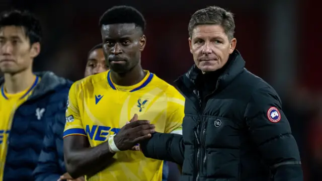 Marc Guehi and Oliver Glasner shake hands