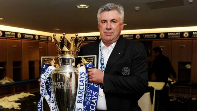 Carlo Ancelotti with the Premier League trophy