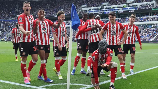 Enzo Le Fee of Sunderland scores the second goal for his team and dons a Spiderman mask in celebration.